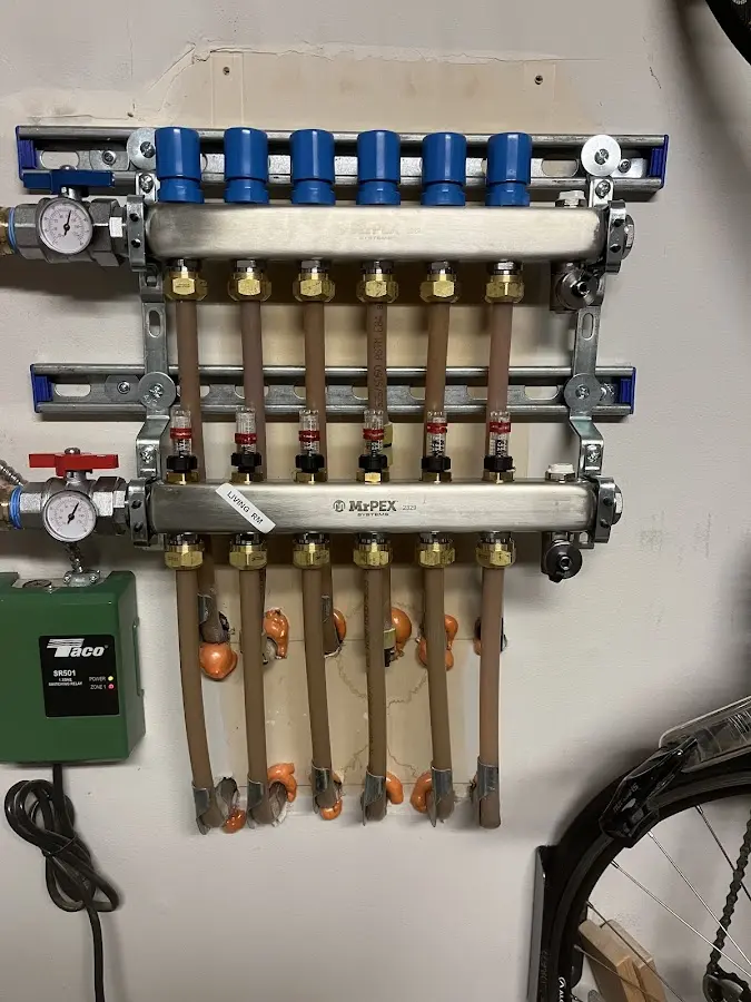 Plumber performing Leak Detection at a residential property in Findlay